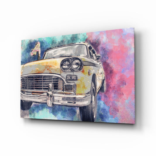 Angled view of a glass wall art panel featuring a vintage yellow taxi cab against a watercolor background in pink, blue, and teal tones.