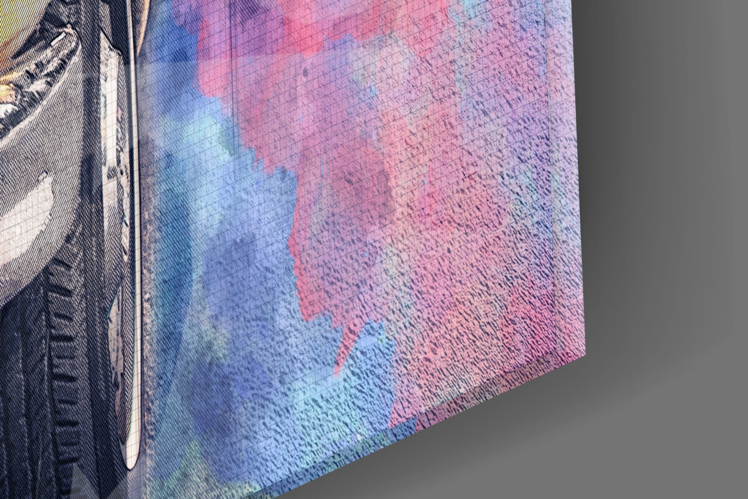 Close-up angled view of textured glass wall art with blue, pink, and red watercolor-style design and partial black taxi illustration on left edge.