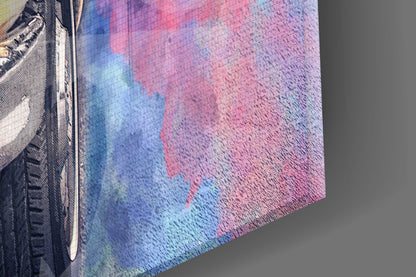 Close-up angled view of textured glass wall art with blue, pink, and red watercolor-style design and partial black taxi illustration on left edge.