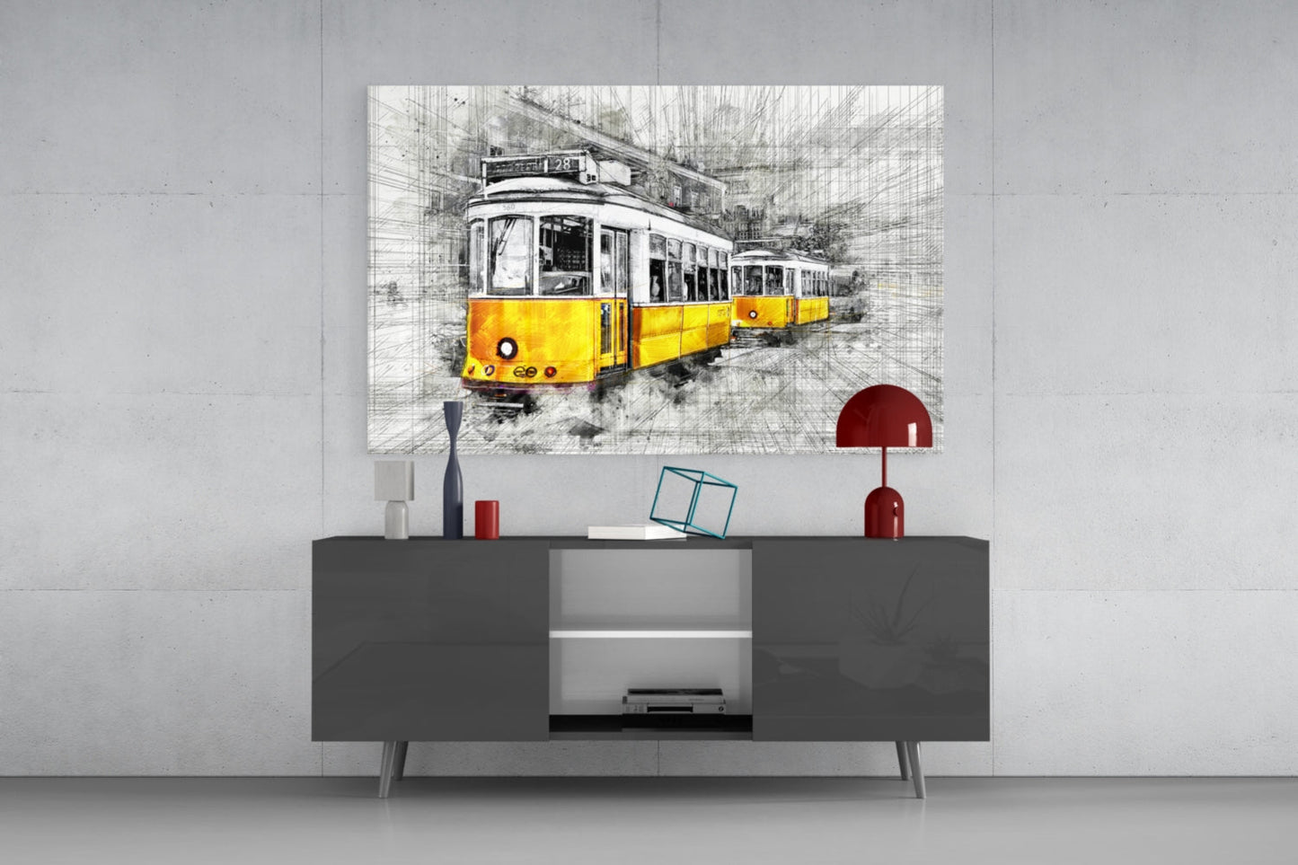 Yellow tram glass wall art displayed above dark gray media console in modern living room interior.