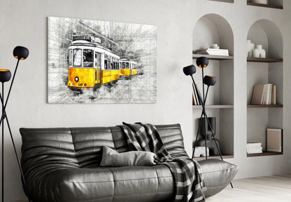 Yellow tram glass wall art displayed above black leather sofa in contemporary living room with shelving.