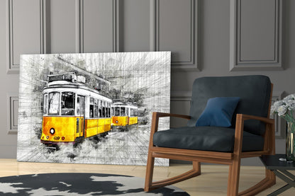 Yellow tram glass wall art displayed in modern living room next to wooden rocking chair with blue cushion.
