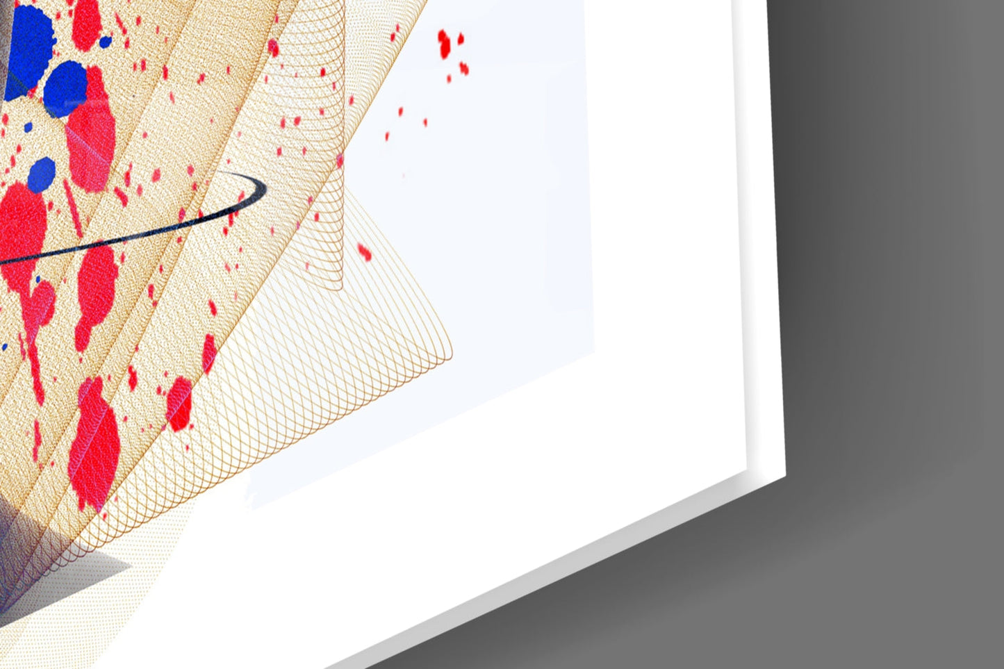 Close-up angled view of glass wall art with red and blue abstract patterns on cream mesh texture background.
