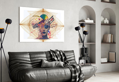Modern living room with black leather sofa displaying colorful abstract portrait glass wall art above it.