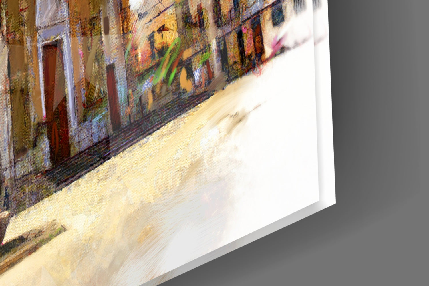 Angled view of glass wall art displaying colorful historic buildings with red doors and weathered stone facade on white background.