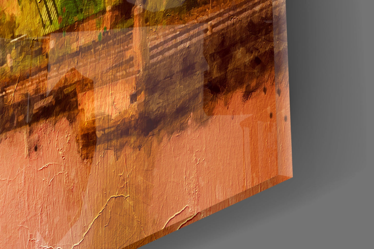 Close-up detail of textured glass surface showing warm orange and brown tones with shadowed relief patterns and brushstroke-like markings.