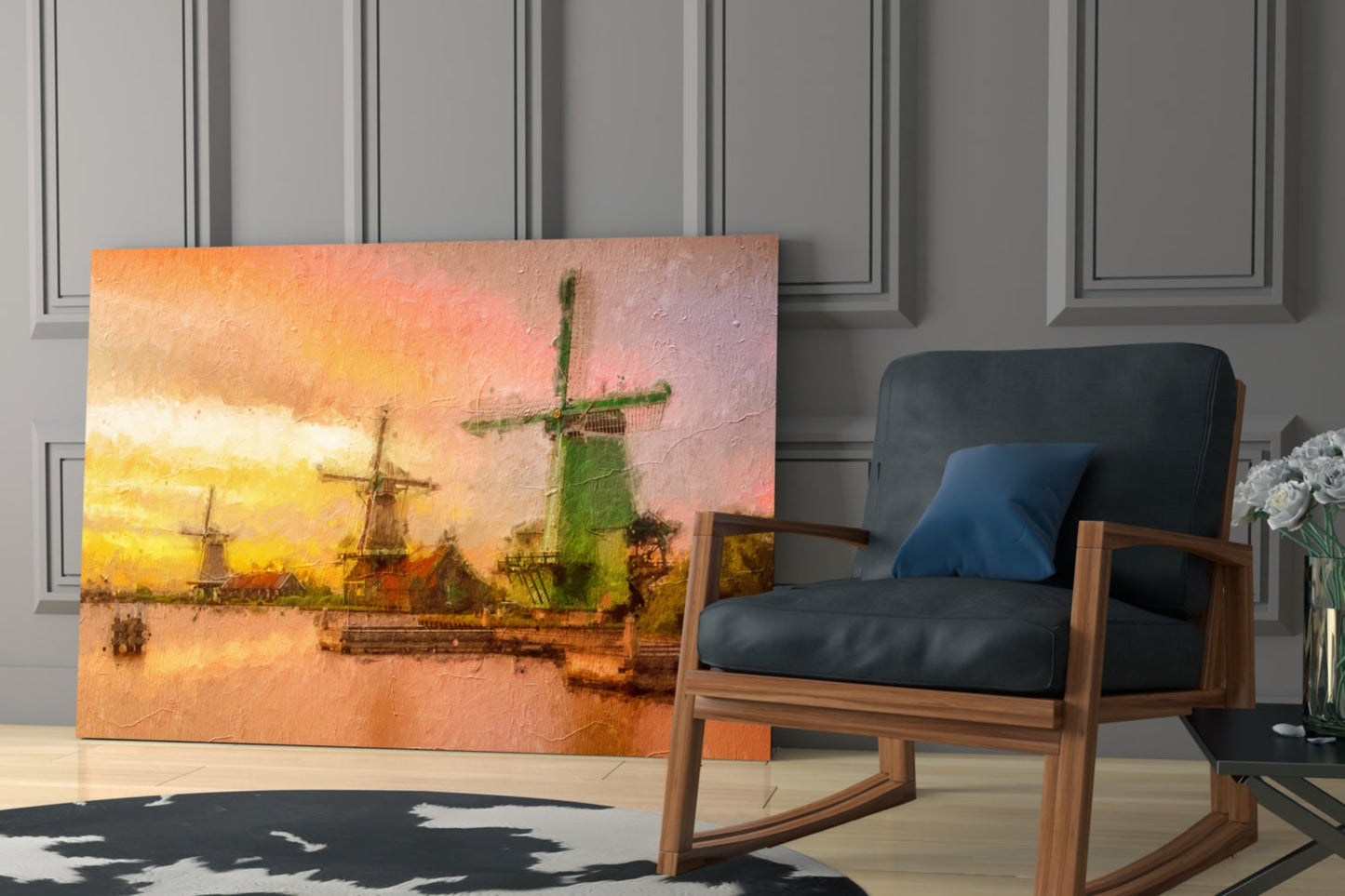 Windmills glass wall art depicting golden sunset over Dutch windmills displayed beside mid-century wooden chair in modern interior.