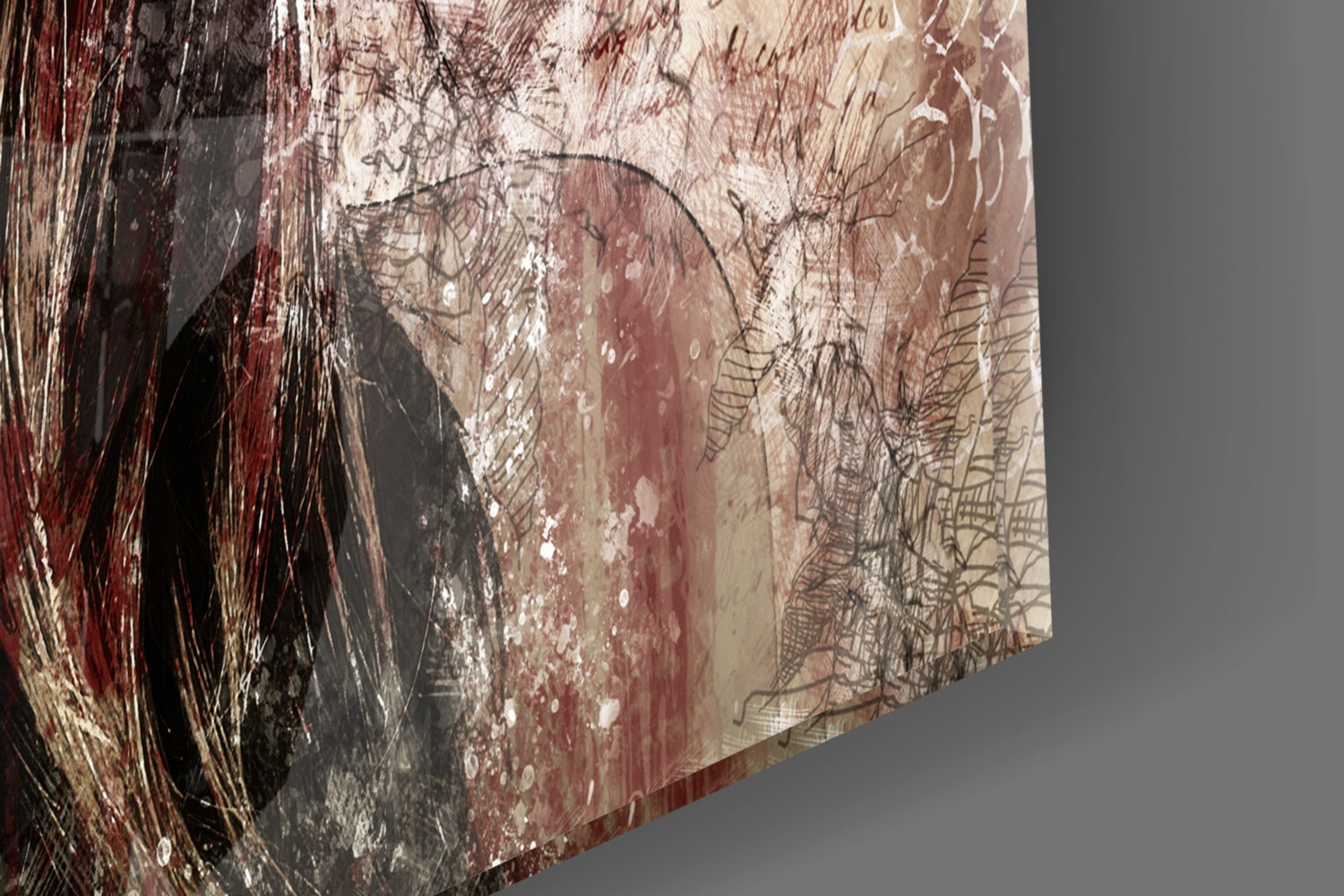 Close-up side angle of glass wall art showing layered portrait with red, brown, and cream tones, fine line details, and textured brushstroke effects.