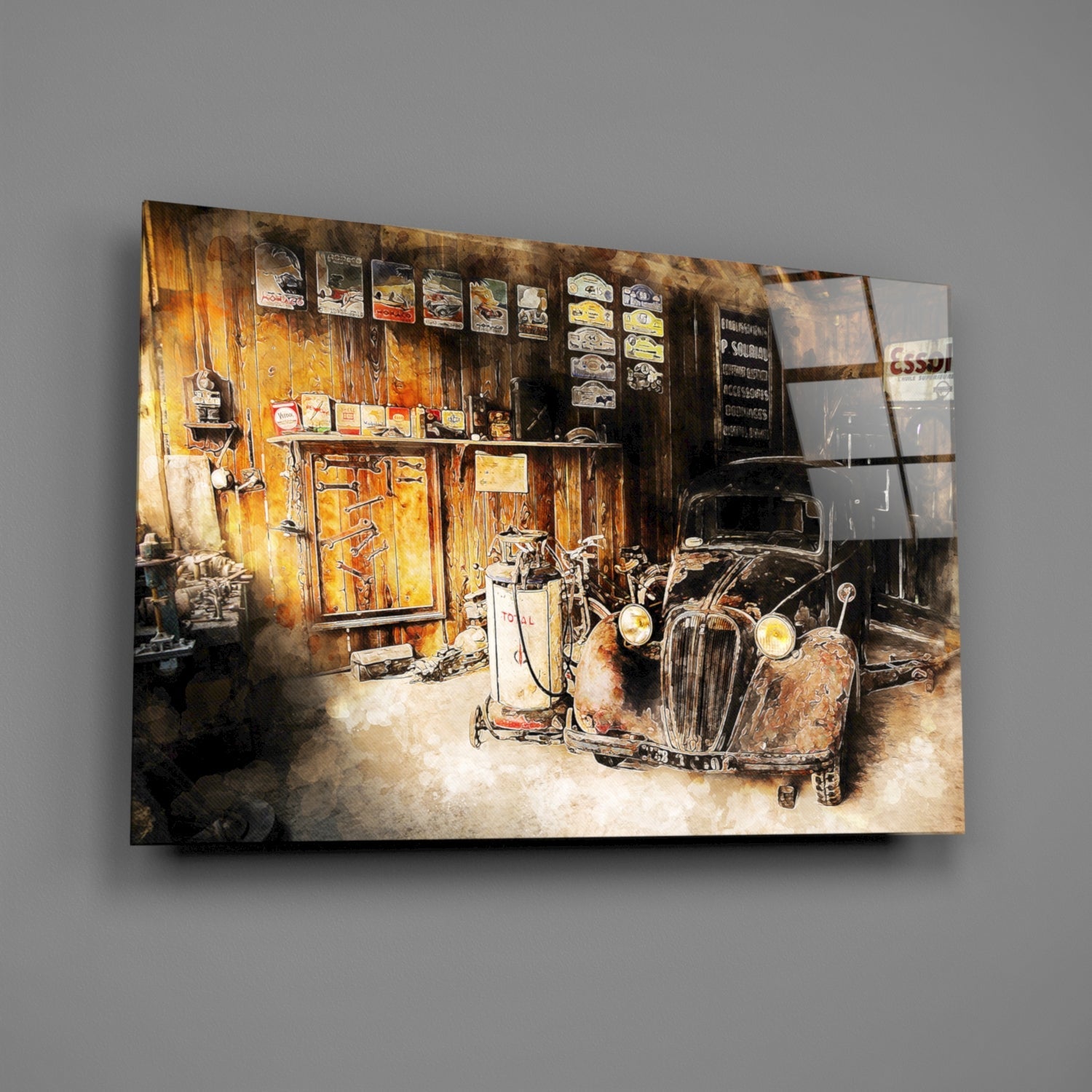 Vintage garage glass wall art showing a weathered wooden workshop with rusted classic car and yellow doors, displayed on gray wall.