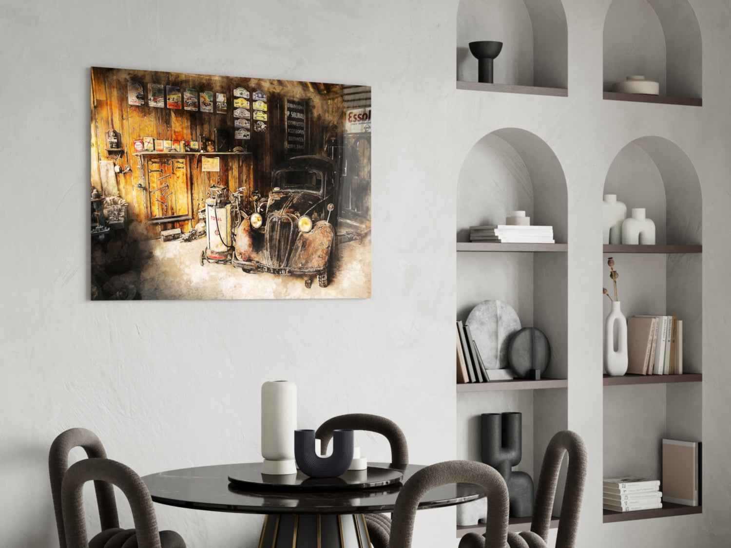 Retro Old Garage glass wall art depicting a weathered vintage car and yellow building facade, displayed above a black dining table in a modern interior.