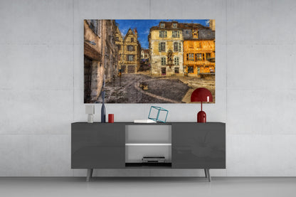 Medieval stone square with colorful half-timbered buildings displayed as wall art above gray media console.