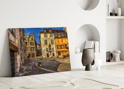 Medieval Square Glass Wall Art leaning against white wall displaying colorful European architecture with yellow and stone buildings under blue sky.
