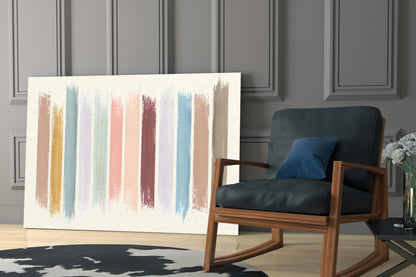 Modern living room displaying vertical brushstroke glass wall art in muted pastels beside wooden mid-century chair.