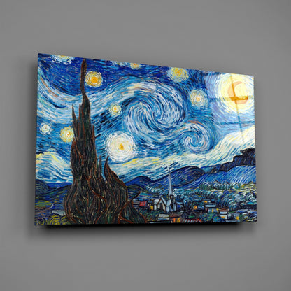 Glass wall art print of Van Gogh's Starry Night displayed at an angle against gray background, showing swirling blue sky with yellow stars and dark cypress tree.
