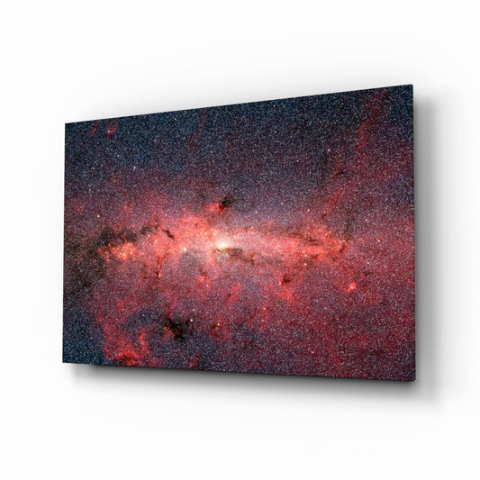 Red Nebula Glass Wall Art displayed at an angled perspective showing the luminous red and pink galactic cloud pattern against a dark starry background on a glass panel.