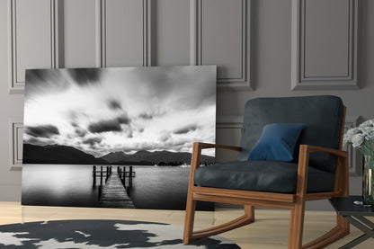 Dramatic Clouds Over Lake Jetty Glass Wall Art