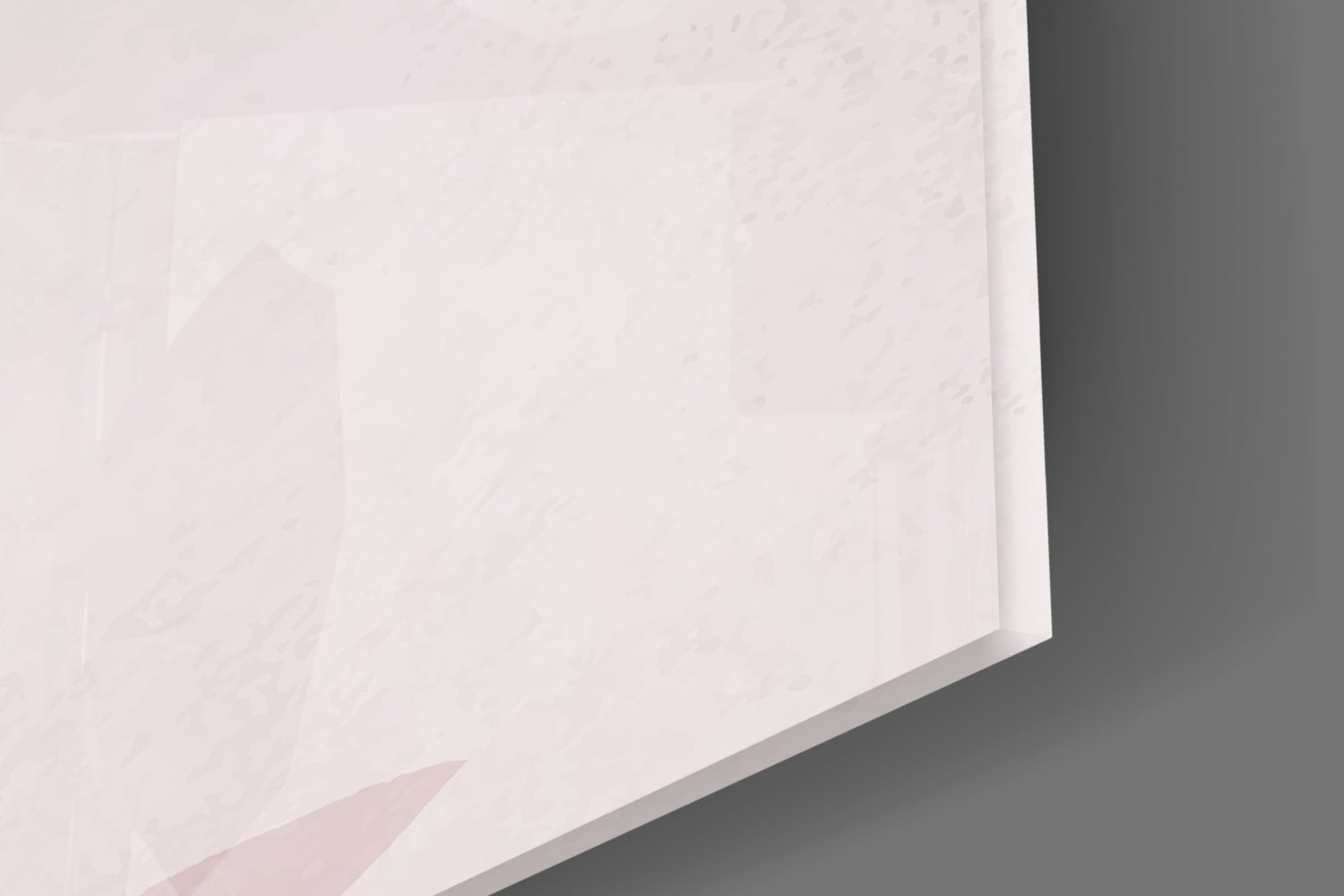 Close-up detail of white glass sheet edge showing subtle pink floral pattern against gray background.