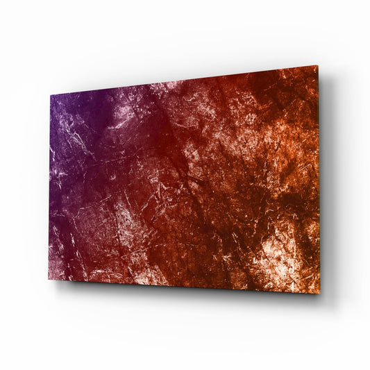 Angled perspective view of a glass wall art panel with purple-to-orange gradient and white distressed texture, displayed against a white background.