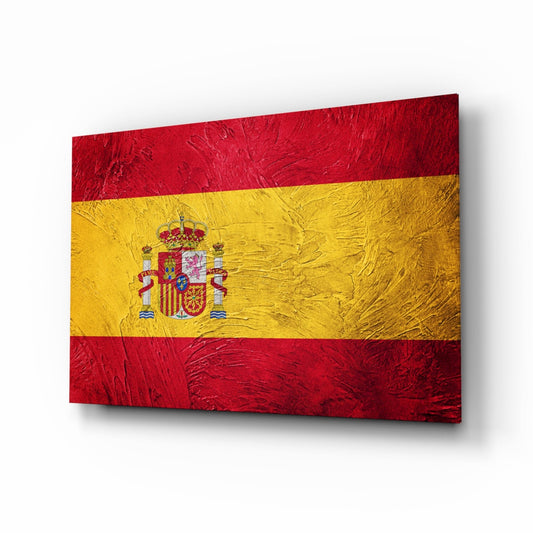 Spanish flag glass wall art displayed at an angle, showing red, yellow, and red horizontal stripes with central coat of arms.