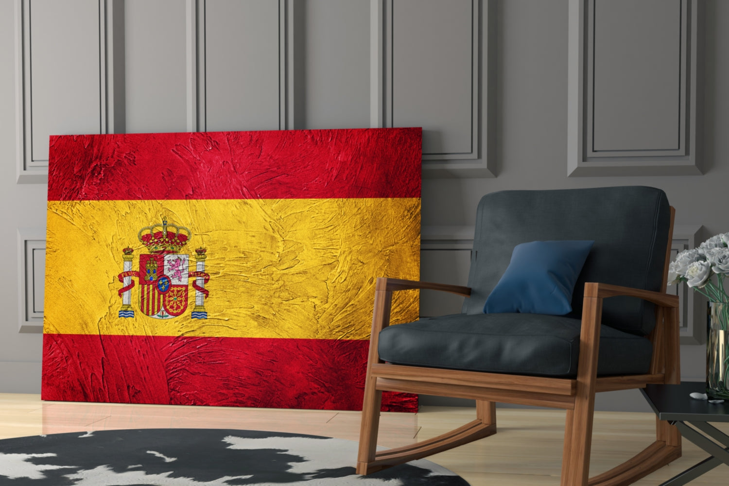 Spanish flag glass wall art with red and yellow stripes and coat of arms displayed in modern living room beside wooden chair.