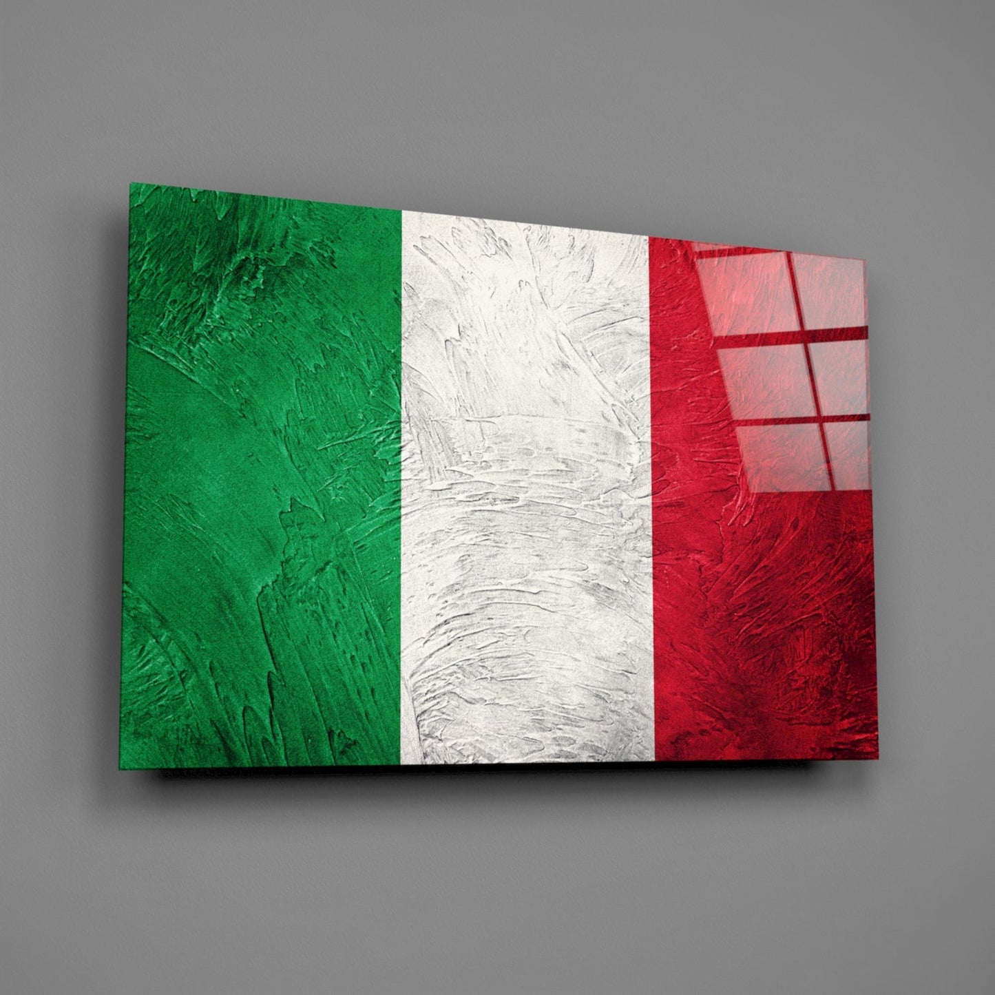 Italian flag glass wall art displaying green, white, and red vertical stripes with textured surface, angled perspective view.