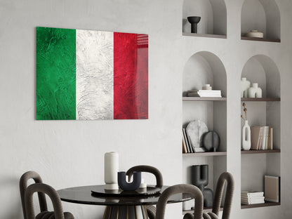 Italian flag glass wall art with textured green, white, and red vertical stripes displayed above dining table.