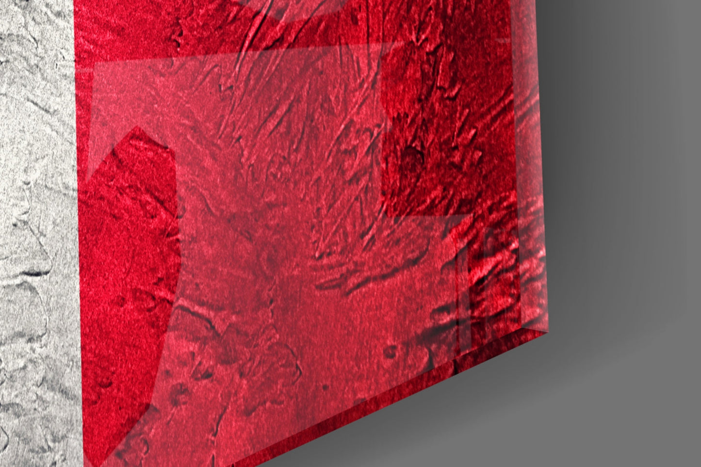 Close-up angled view of red velvet French flag glass art against gray background, showing texture and depth.
