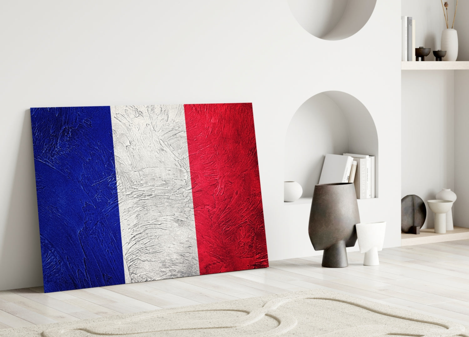 French flag glass wall art with blue, white, and red vertical stripes displayed in modern white interior setting.