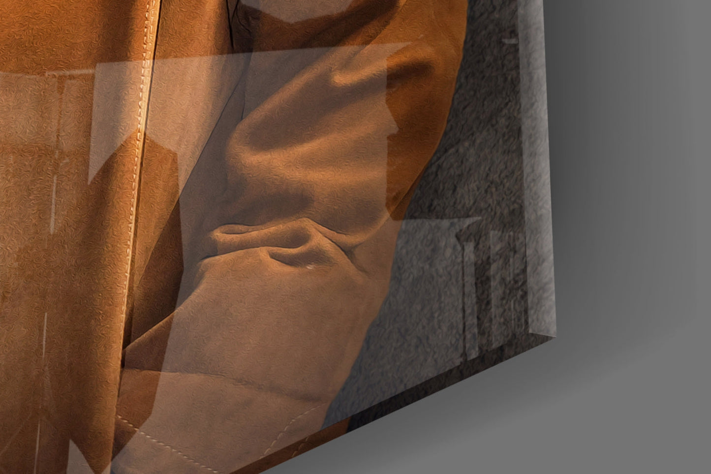 Close-up side view of tiger head glass art showing amber and gray tones with detailed facial features and shadow play on surface.