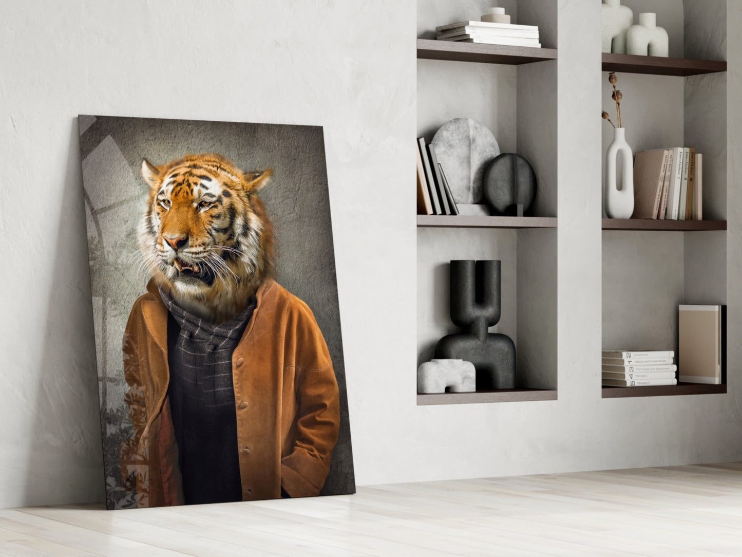 Tiger Head Glass Wall Art leaning against white wall beside built-in shelving with decorative objects and books.