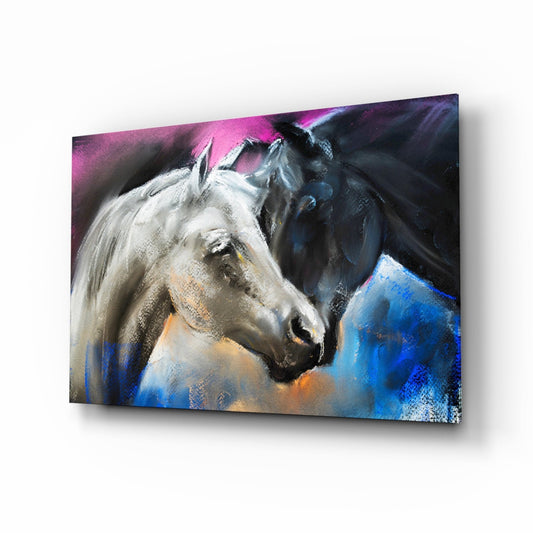 Angled view of glass wall art depicting two horses in profile with white and dark coats against vibrant blue, pink, and orange backgrounds.