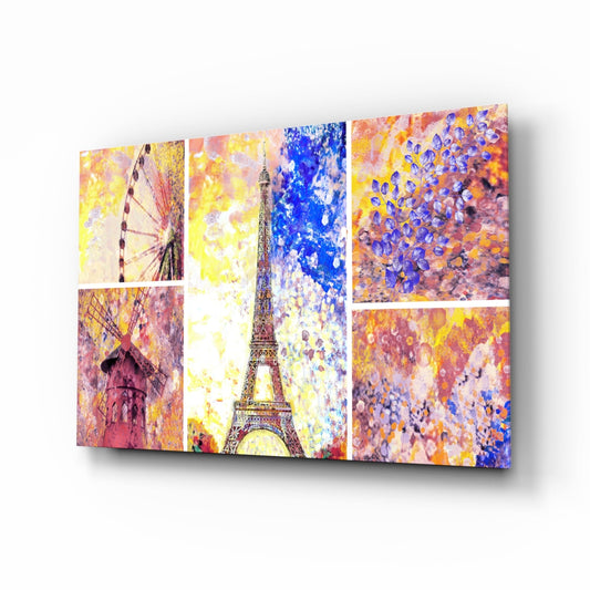 A multi-panel glass wall art display featuring Parisian landmarks including the Eiffel Tower and Ferris wheel with vibrant watercolor splashes in yellows, pinks, blues, and purples.