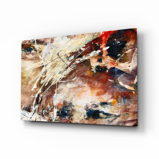 Angled view of rust-toned glass wall art with watercolor splashes in red, brown, cream, and navy blue pigments.
