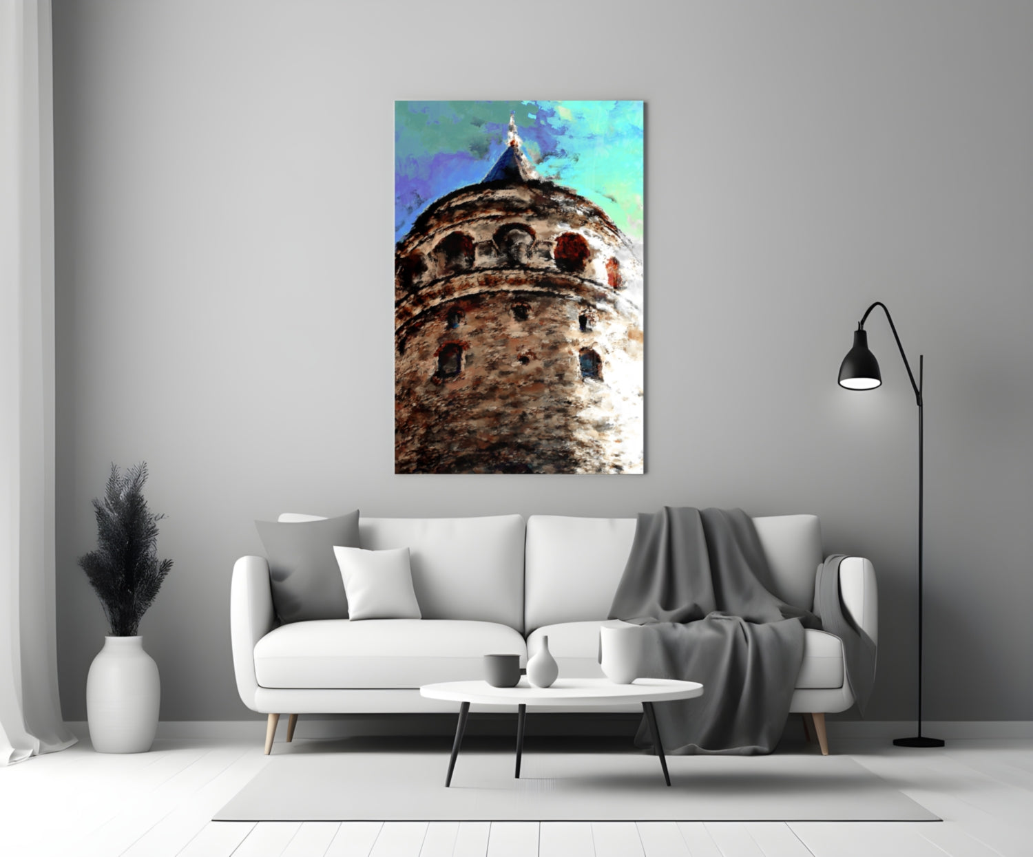Galata Tower glass wall art with textured stone tower and vibrant blue-green sky, displayed above white sofa in modern living room.