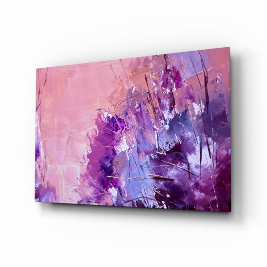 Angled view of purple and pink abstract glass wall art with white brushstrokes and thin black lines, displayed against white background.