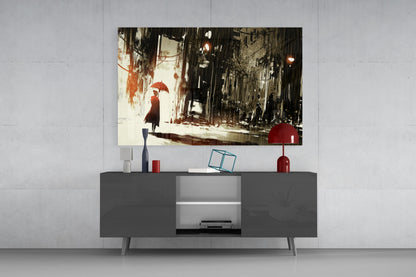 Rainy City Glass Wall Art hung above gray media console, depicting figure with red umbrella on wet street in sepia and black tones.