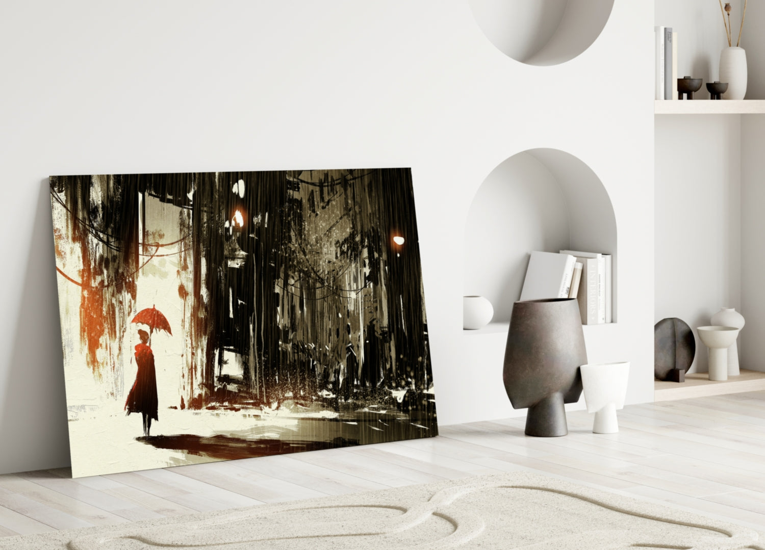 Glass wall art depicting a figure with red umbrella in sepia-toned rainy street scene, leaning against white wall in modern interior.