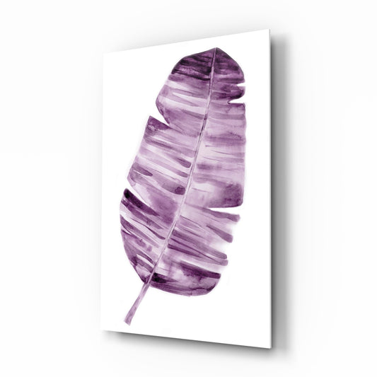 Purple watercolor banana leaf on white background displayed as angled glass wall art with shadow effect.