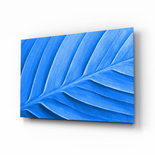 Blue Leaf Glass Wall Art displayed at an angled perspective showing carved leaf vein details and gradient shading.