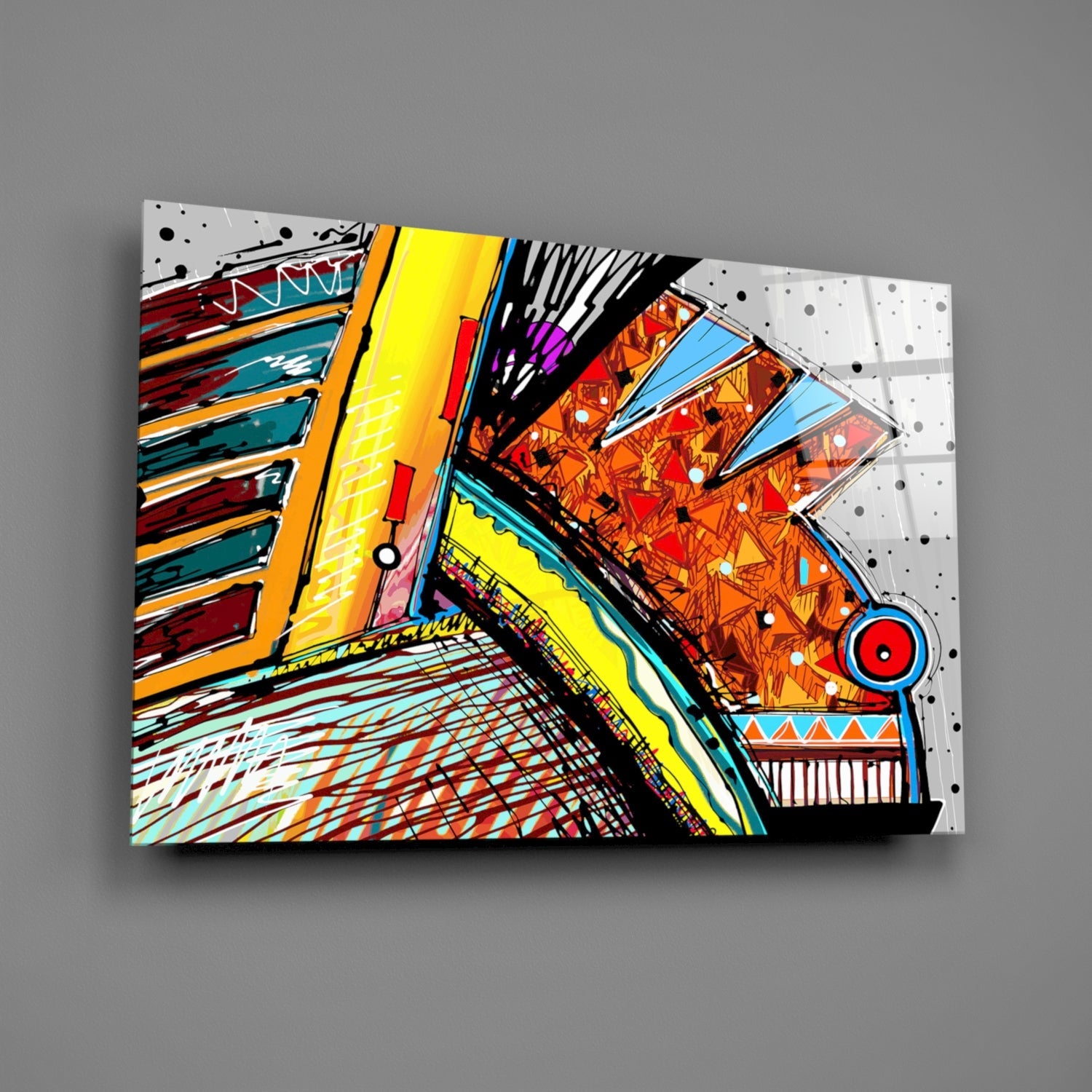 Colorful abstract glass wall art displayed at an angle against gray background, featuring vibrant geometric patterns in yellow, red, orange, blue, and black with decorative designs.