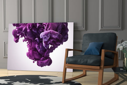 Purple smoke glass wall art displayed leaning against grey paneled wall beside wooden chair with black cushions.