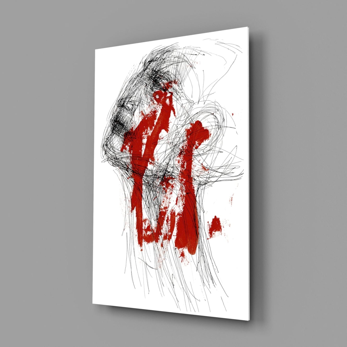 Glass wall art featuring a sketched profile head in black lines with bold red paint strokes through the center, displayed at an angle against gray background.