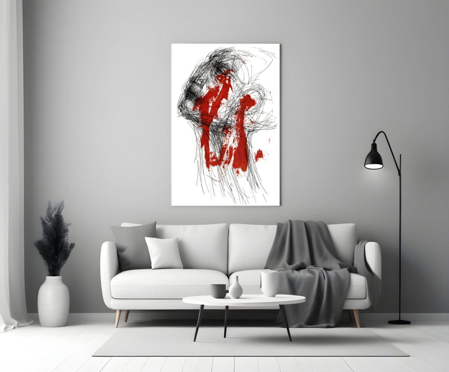 Red Thoughts glass wall art displayed above a white sofa in a minimalist living room interior.