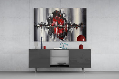 Modern living room display featuring City Reflection Glass Wall Art with red and gray cityscape above dark console table with decorative accessories.