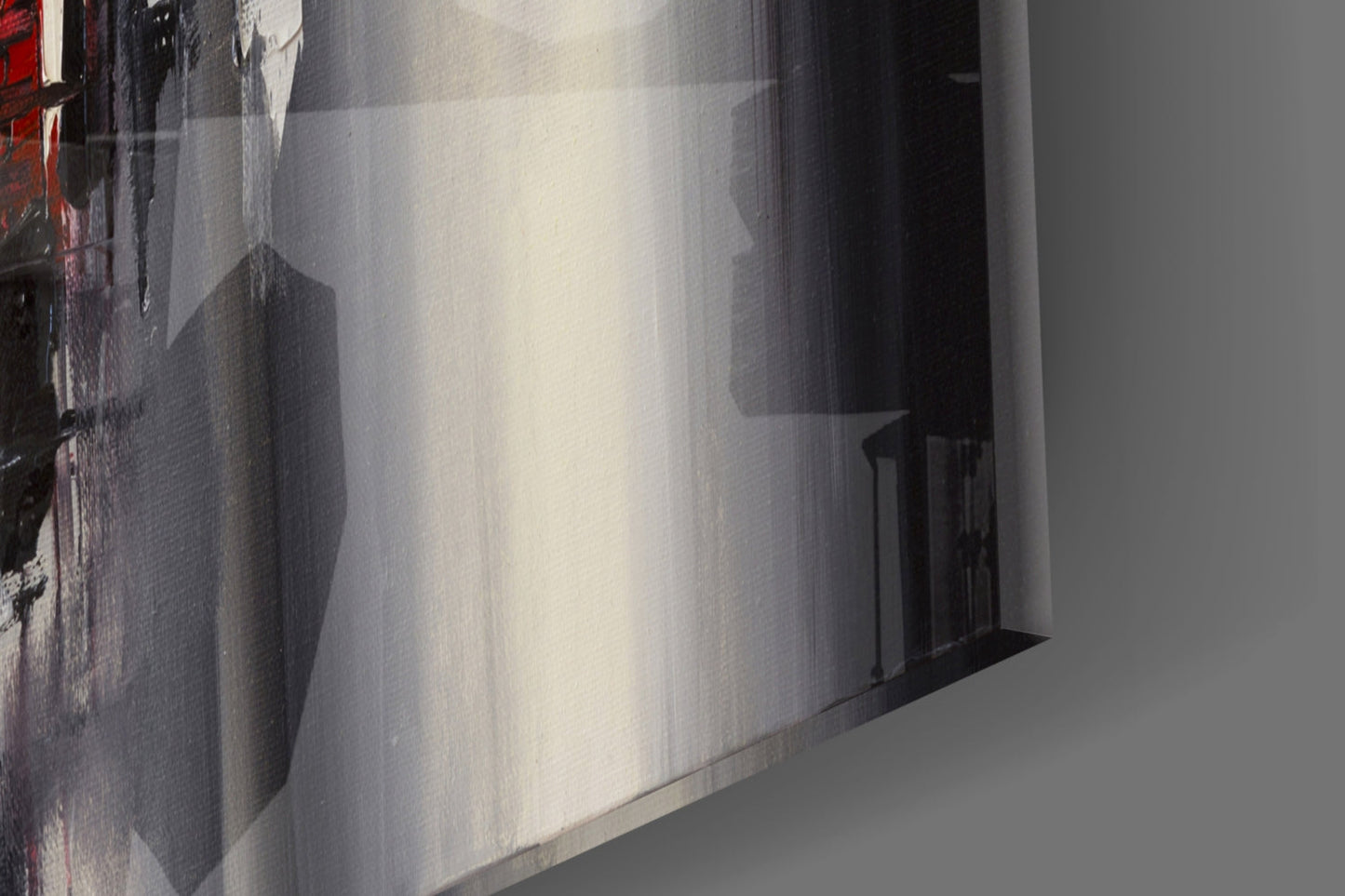 Glass wall art panel displaying urban alleyway with brick buildings and dramatic shadow reflections in grayscale tones.