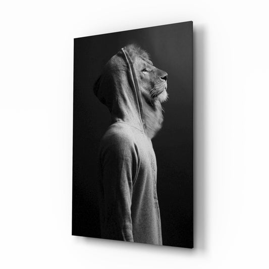 Black and white glass wall art featuring a lion's profile wearing a gray hoodie against a dark background.