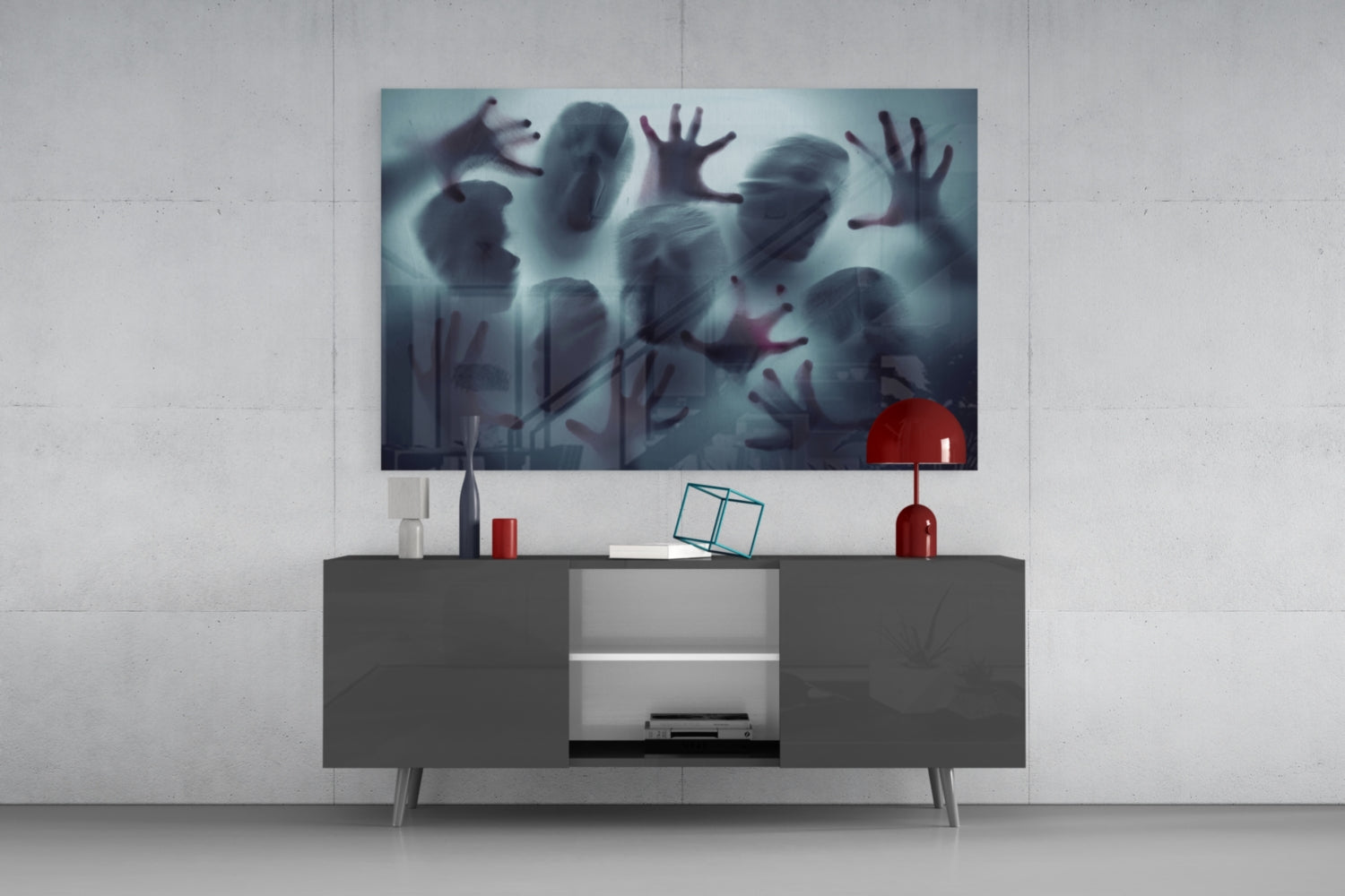 Silent Scream glass wall art mounted above gray media console, displaying ghostly figures with raised hands in blue and red tones.