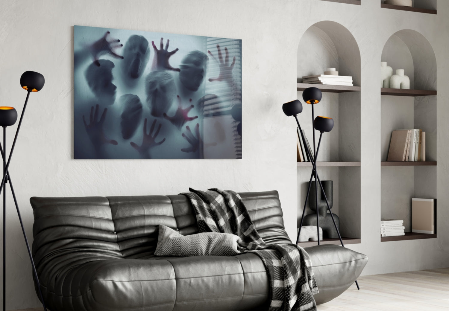 Silent Scream glass wall art hanging above gray leather sofa in modern living room with shelving and black floor lamp.