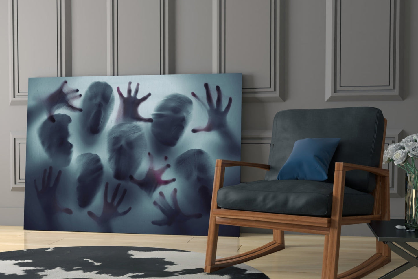 Silent Scream Glass Wall Art displayed in modern living room beside wooden chair, showing blurred hands and faces in blue and burgundy tones.