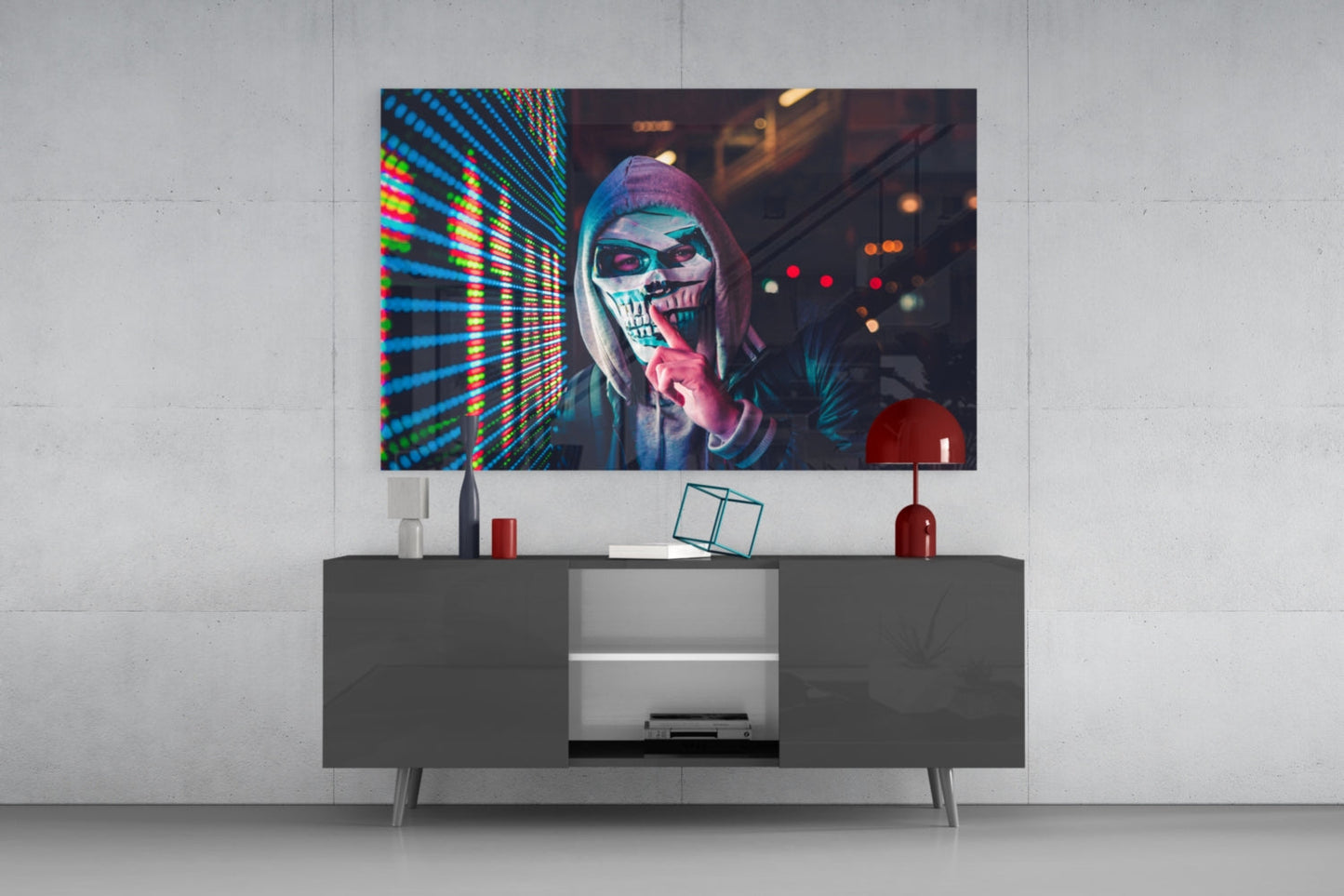 Be quiet! glass wall art displaying neon skull portrait mounted above gray media console in modern living room setting.
